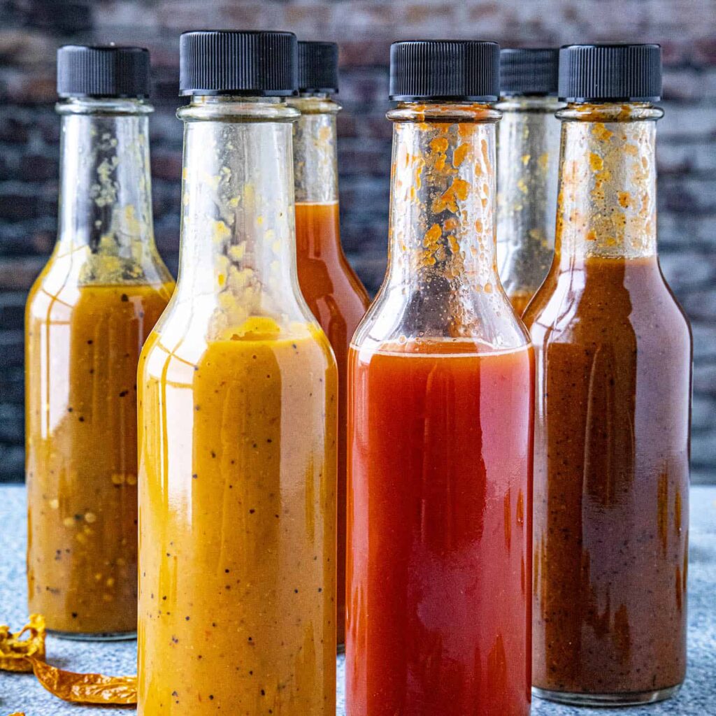 a group of bottles of hot sauce